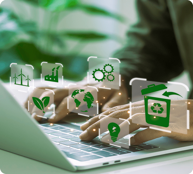 Hands typing on laptop with eco icons.